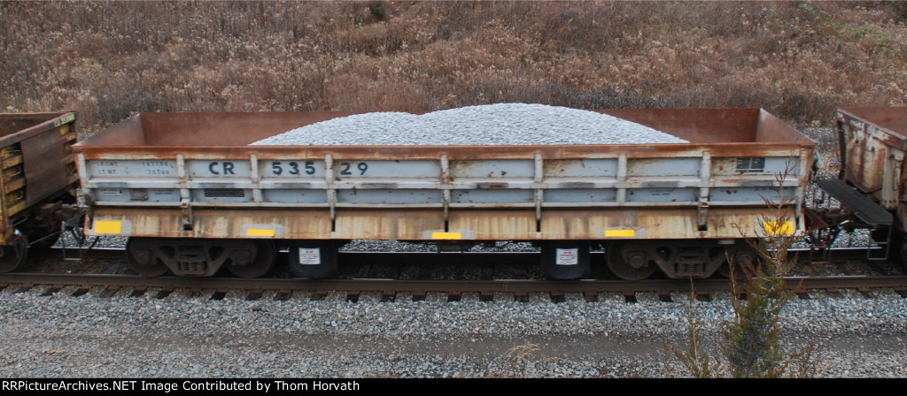 CR 53529 is one of many ex-CR ballast cars found in 410's consist